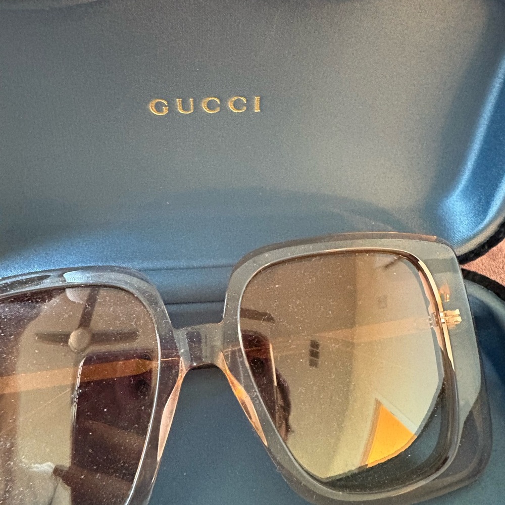 Gucci Transparent Frame Sunglasses with Tinted Lenses